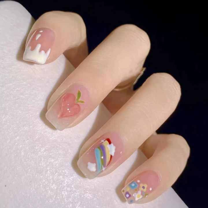 Kreative Nagelkunst mit Obst- und Blumenmotiven Karnz