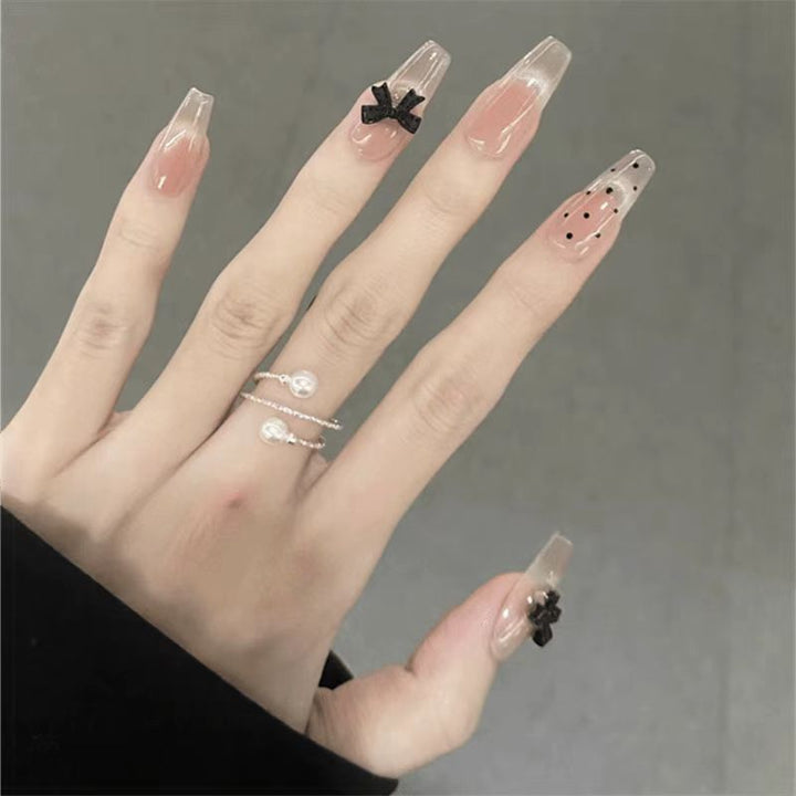 Trendige Aufklebe-Nagelkunst-Set mit stilvollen Schleifenakzenten Karnz