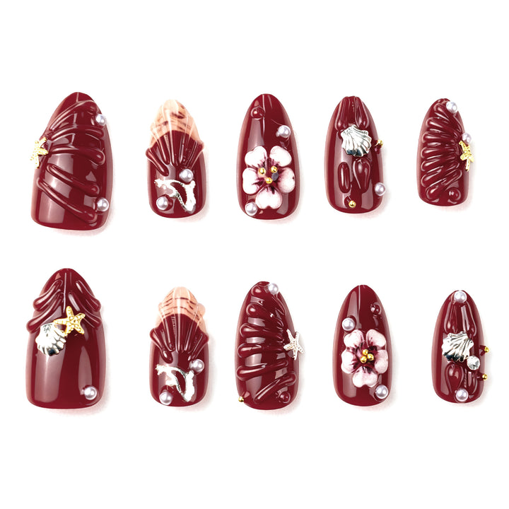 Kunstnagelset mit floralen Strassverzierungen Karnz