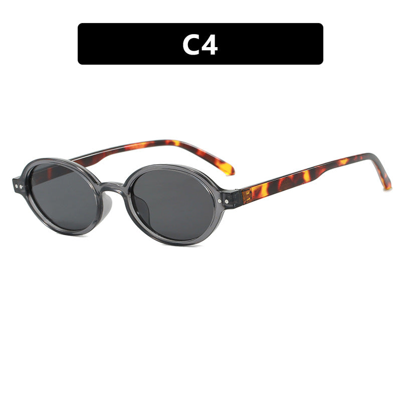 Damen modische ovalförmige Sonnenbrille mit ausgefallenem Rahmen Karnz
