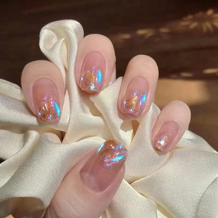 Kunstnägel mit Glitzer- und Farbverlaufsdesign Karnz