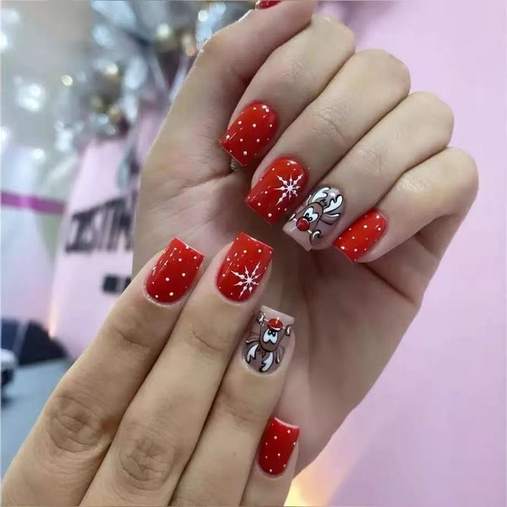 Weihnachts Kunstnagelset mit lebendigen Rentier- und Schneeflockenmotiven Karnz