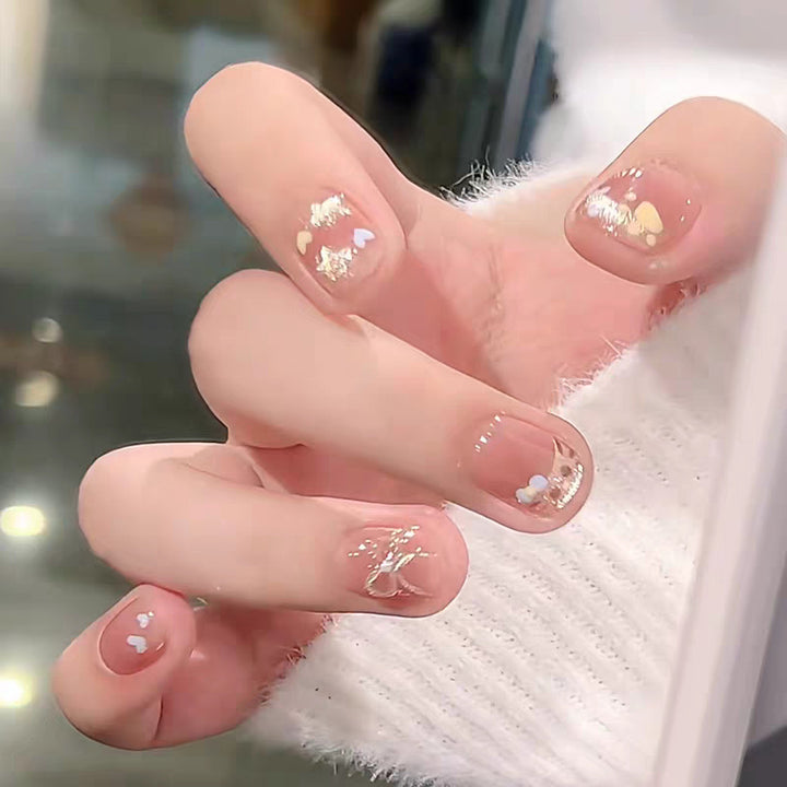 Künstlerische Press-On-Nagelverlängerungen mit floralen Verzierungen Karnz
