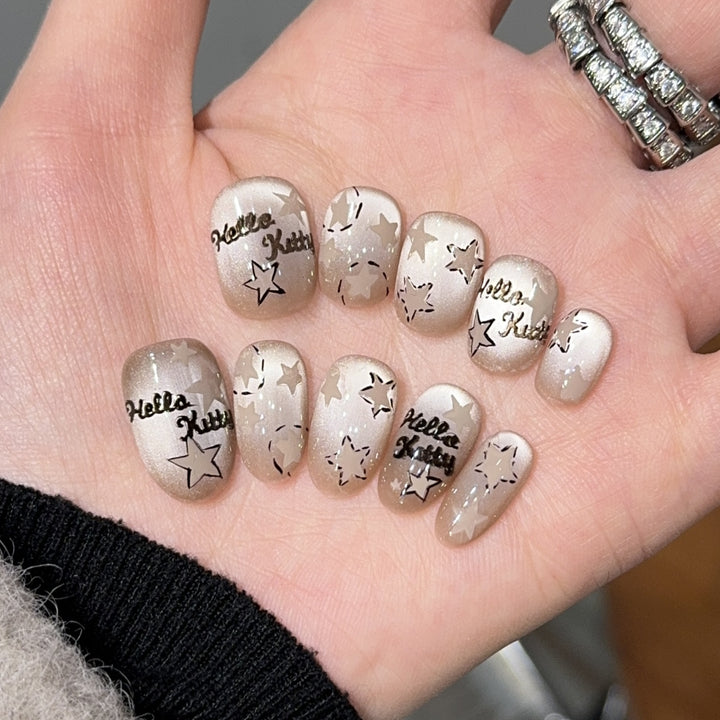 Künstliche Nagelspitzen mit Hello Kitty-Design Karnz