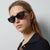 Damen Cat-Eye Sonnenbrille mit transparentem Rahmen und braunen Gläsern Karnz