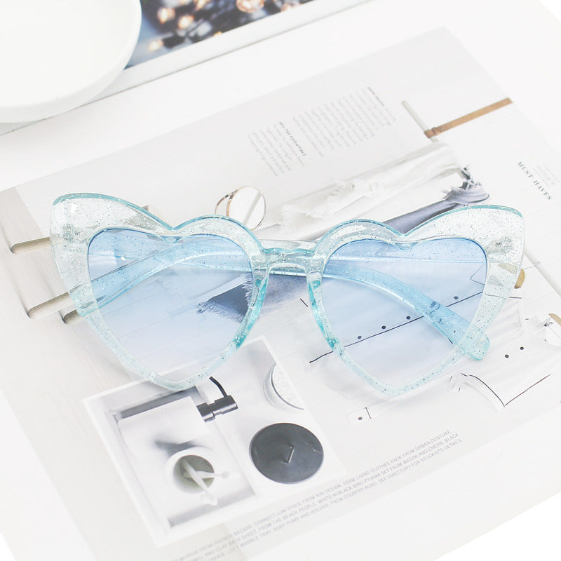 Damen Herzförmige Sonnenbrille mit glitzerndem Rahmen Karnz