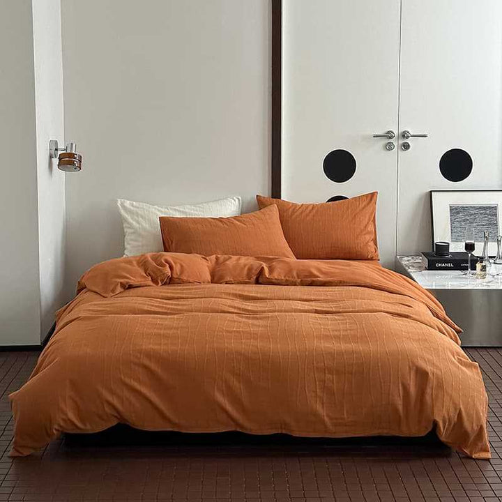 Gepflegtes Percale-Baumwoll-Bettwäsche-Set mit subtiler welliger Textur und Umschlagverschluss