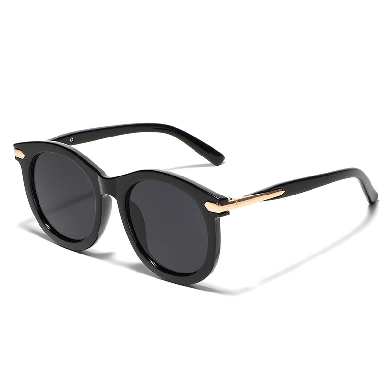 Damen modische Sonnenbrille mit transparentem Rahmen und goldenen Akzenten Karnz