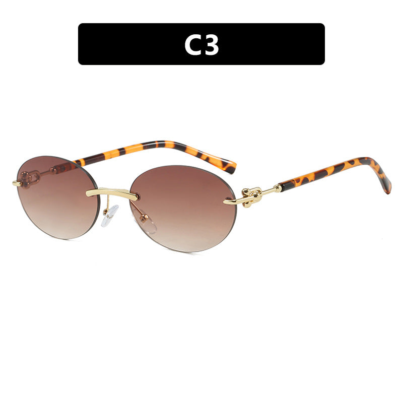 Damen ovale Sonnenbrille mit luxuriösem Metallrahmen und verspiegelten Gläsern Karnz