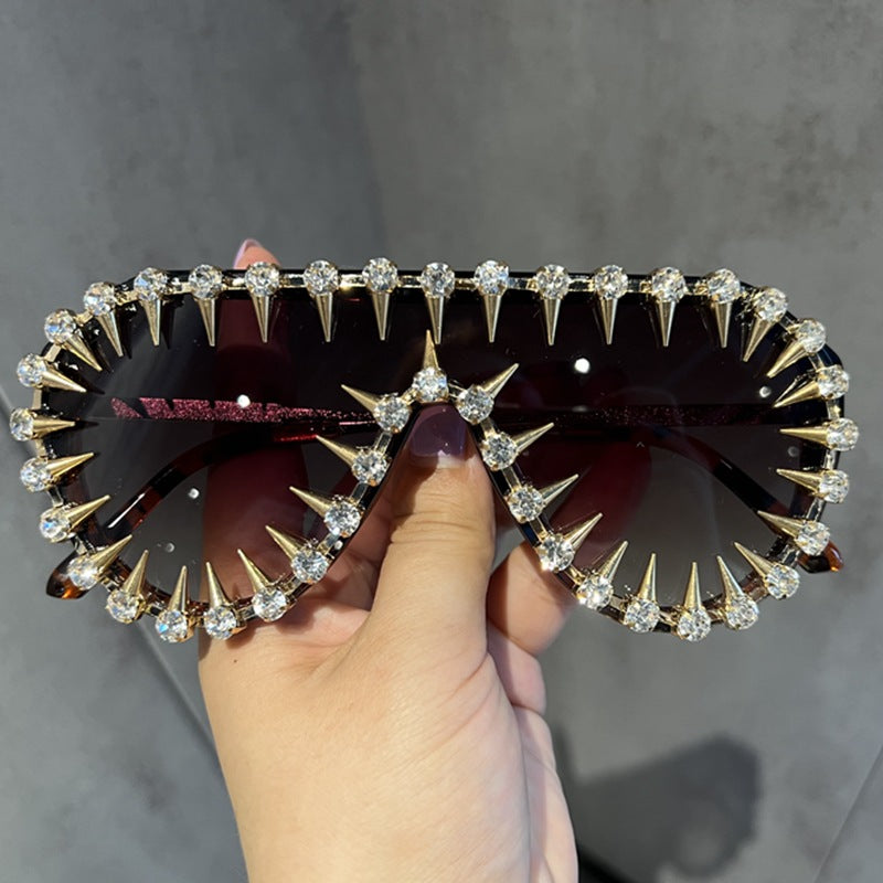 Damen extravagant gestaltete Cat-Eye-Sonnenbrille mit Glitzerakzenten Karnz