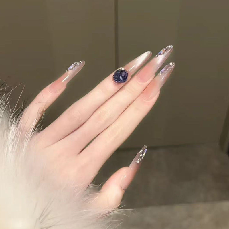 Künstlerisches Stiletto Press-On Nagelset mit Glitzer und Edelsteinakzenten Karnz