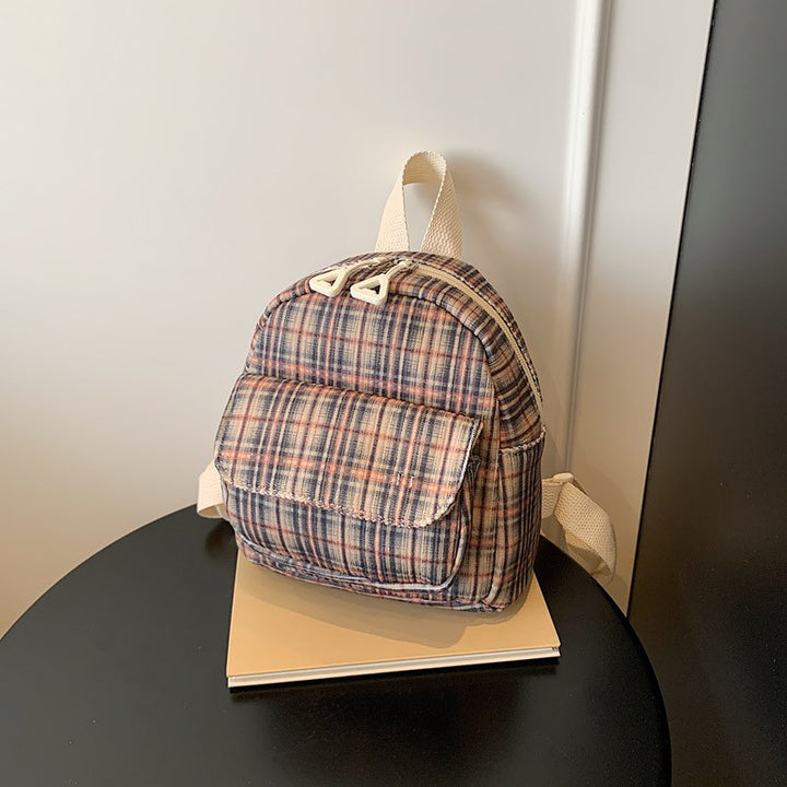 Kompakter gestreifter Mini-Rucksack