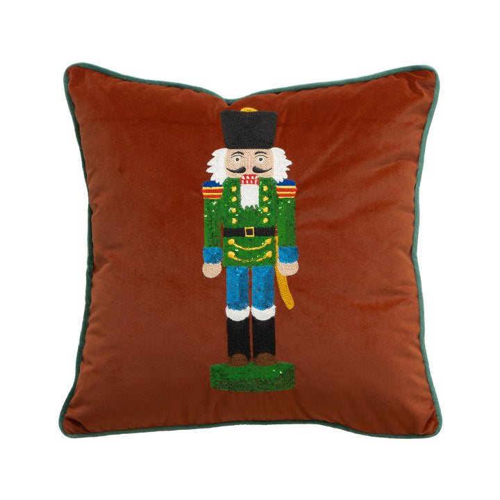 Weihnachtliches Dekokissen mit Nussknacker-Stickerei und Paspelrand