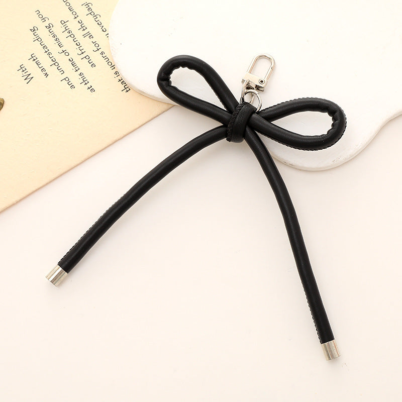 Stylischer Schleifen-Knoten Schlüsselanhänger Halter Karnz