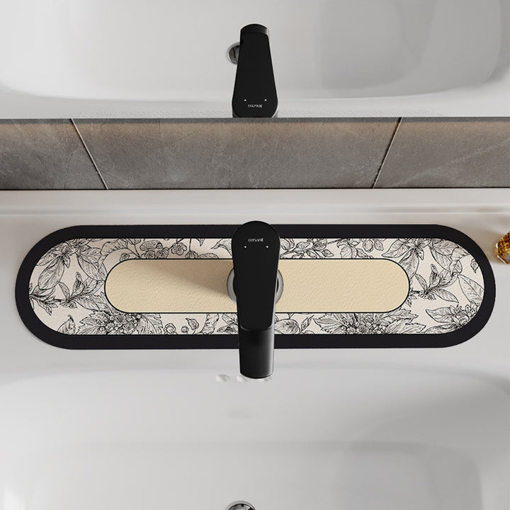 Decorative Oval Silicone Faucet Splash Guard Mat with Floral Engraved Print and Non-Slip Backing