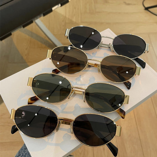 Damen elegante ovale Sonnenbrille mit goldfarbenem Rahmen Karnz
