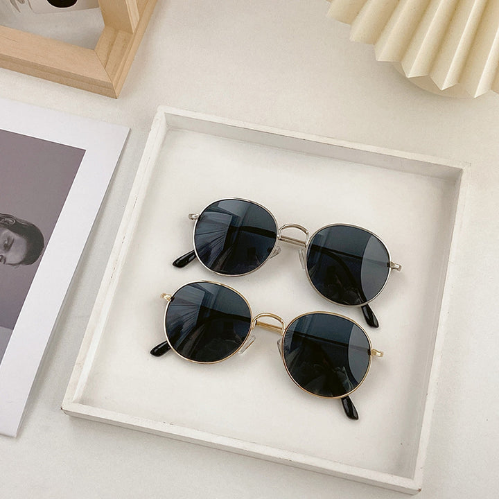 Modische Runde Sonnenbrille mit Goldener Fassung Karnz