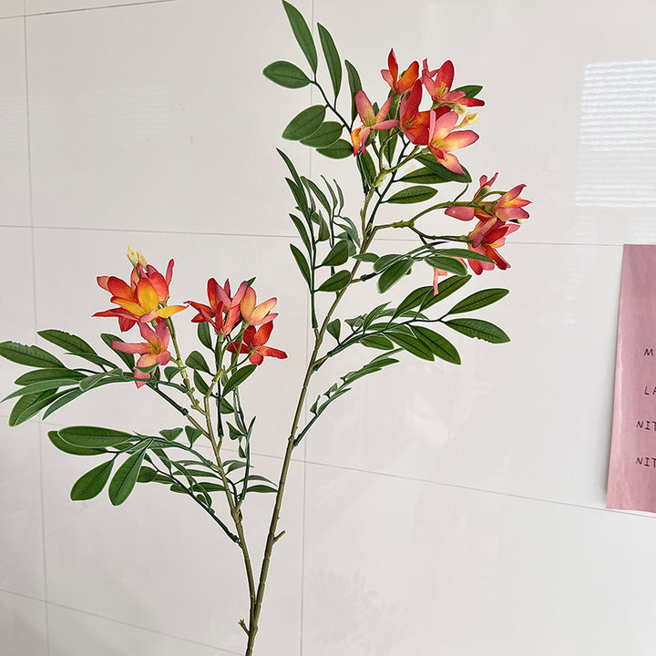 Dekorativer Kunstblütenzweig mit zarten Blüten Karnz