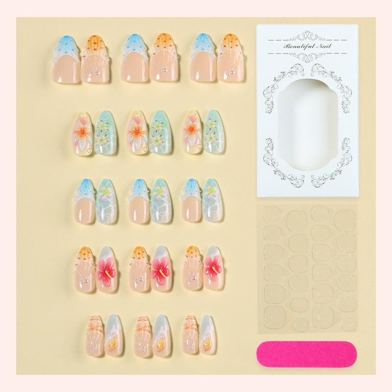 Kunstnagelset mit farbenfrohen Blumen- und maritimen Designs Karnz