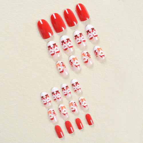 Kunstnagelset im festlichen Weihnachtsdesign mit niedlichen Motiven Karnz