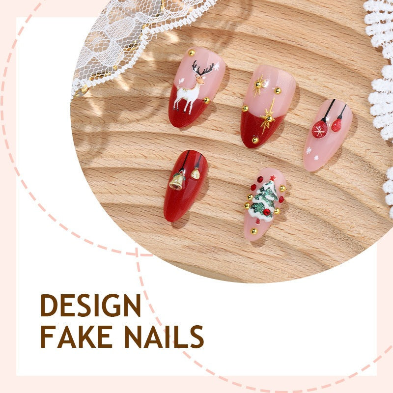 Kunstnagelset mit festlichen Motiven und Glitzerelementen Karnz