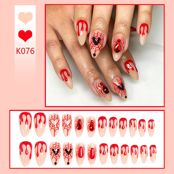 Kunstnagelset mit Halloween-Motiv und detailreichen Verzierungen Karnz