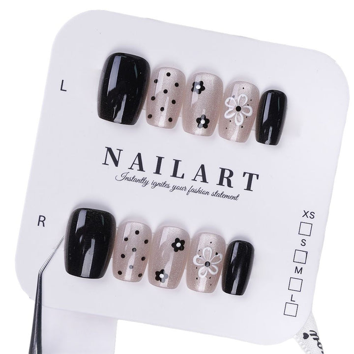 Künstlerisches Press-On Nagelset mit floralem und gesprenkelt Design Karnz