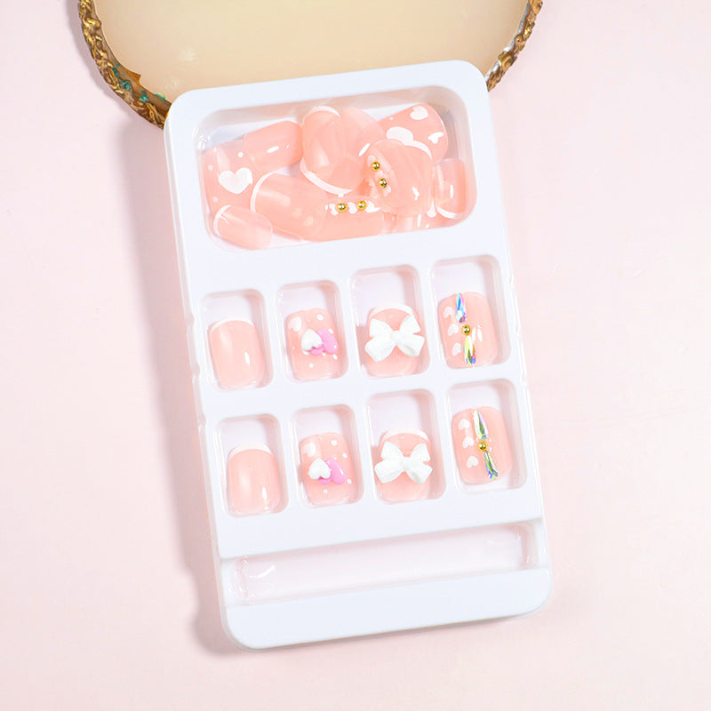 Dekorativer Press-On Nail Art Set mit Schleifenakzenten Karnz