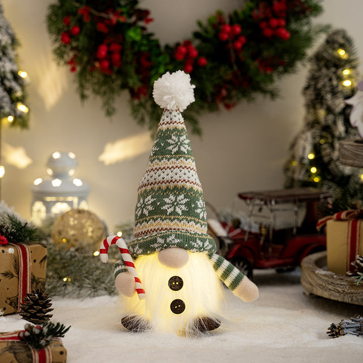 Dekorative Weihnachtsgnom mit leuchtenden Details Karnz