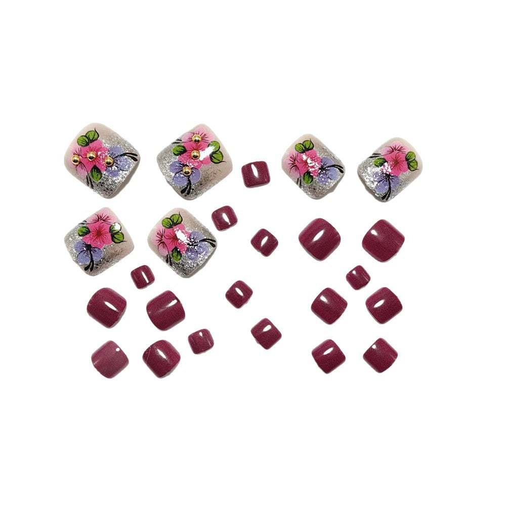 Kunstnägel mit Floralen Designs und Glitzereffekten Karnz