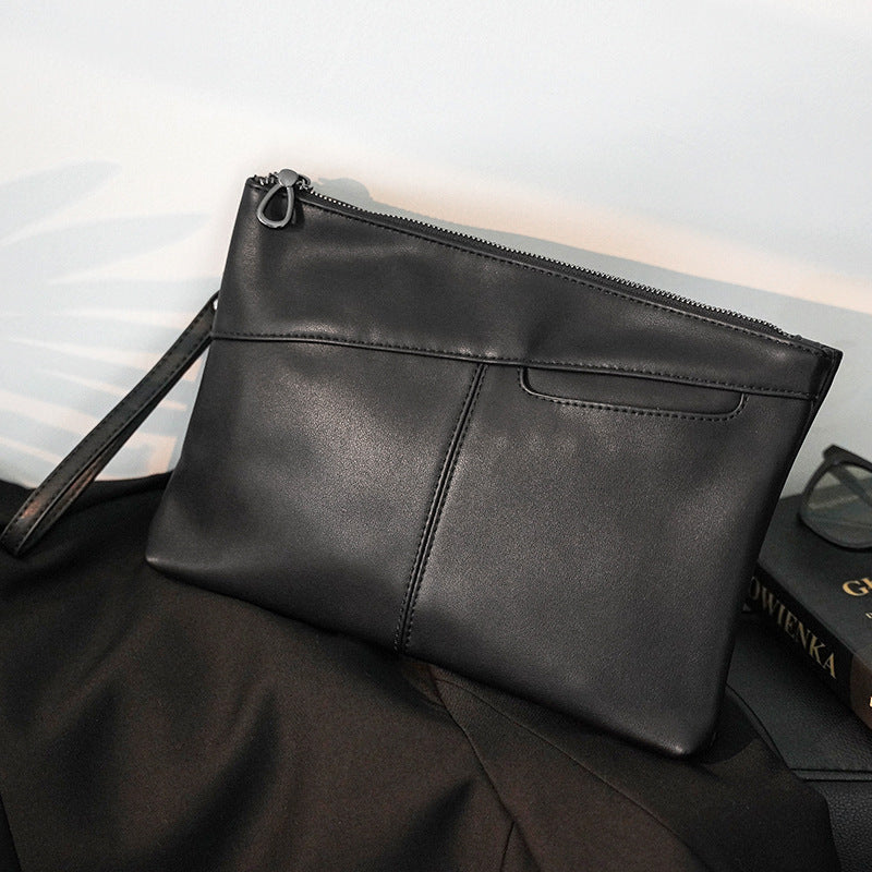 Elegante Leder-Clutch Karnz