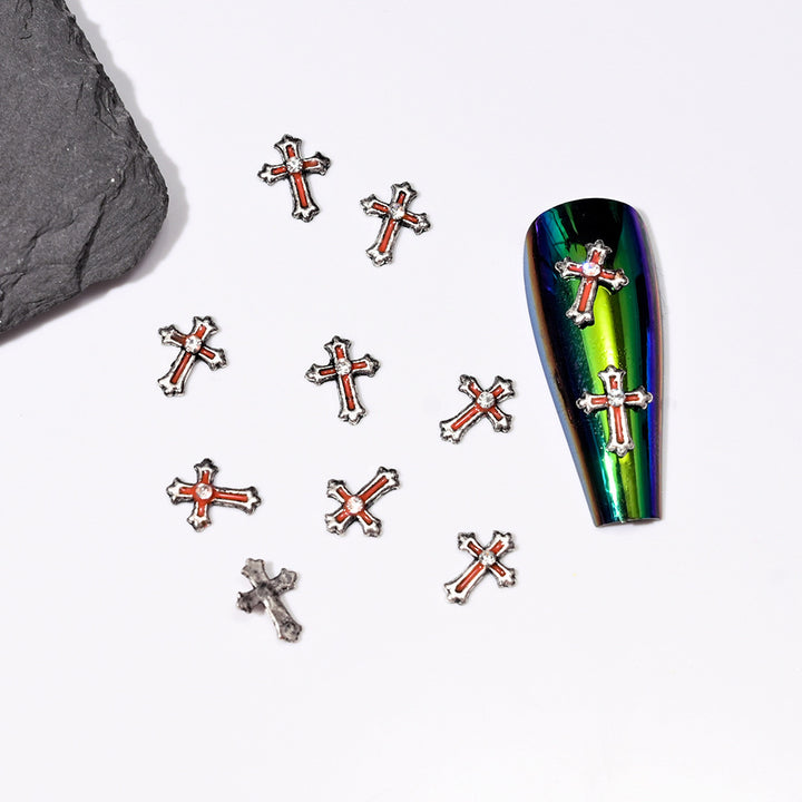 Kreuzförmige Nagelkunst-Verzierungen