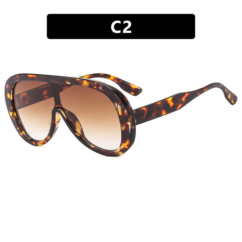 Damen futuristische Sportsonnenbrille mit breiter Sichtscheibe und UV-Schutz Karnz