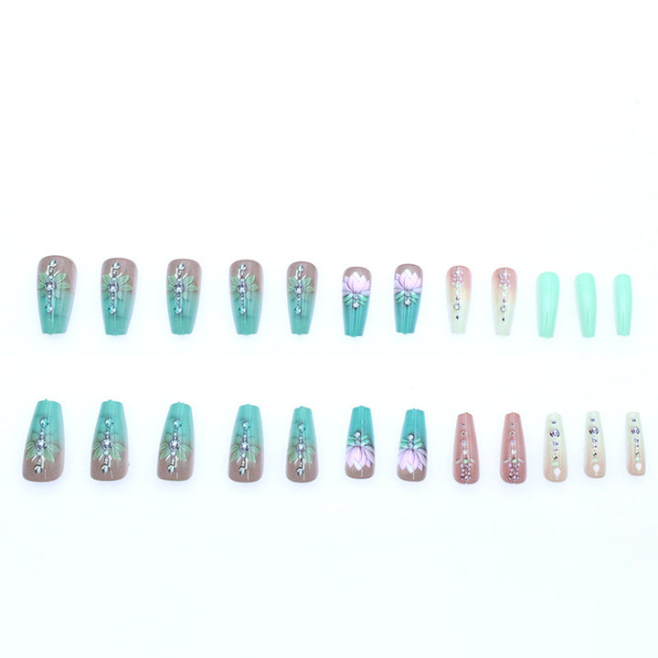 Elegante florale Edelstein-Nagelkunst Karnz
