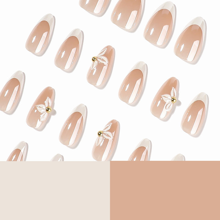 Kunstvolle Stiletto-Nägel mit elegantem Blumendesign Karnz