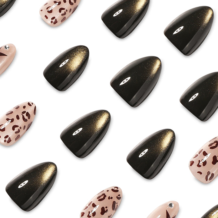 Kunstvolle Nagelverlängerungen mit glamourösen Leo-Design Karnz