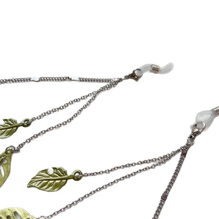 Modische Brillenhalterkette mit Blattmotiven Karnz