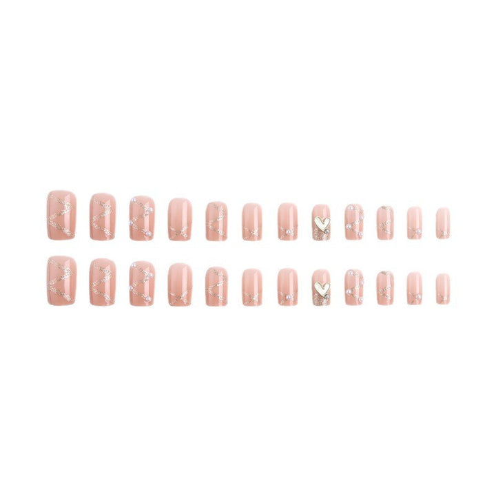 Kunstnagelset mit eleganten Perlen- und Glitzerakzenten Karnz