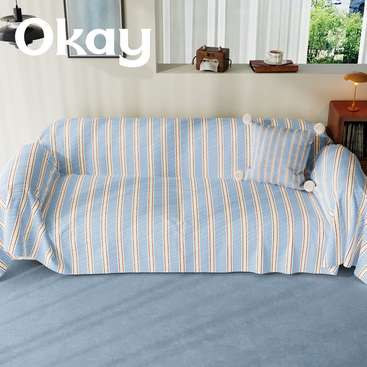 Quilted Striped Reversible Sofa Slipcover with Pom-Pom Accent Pillow
