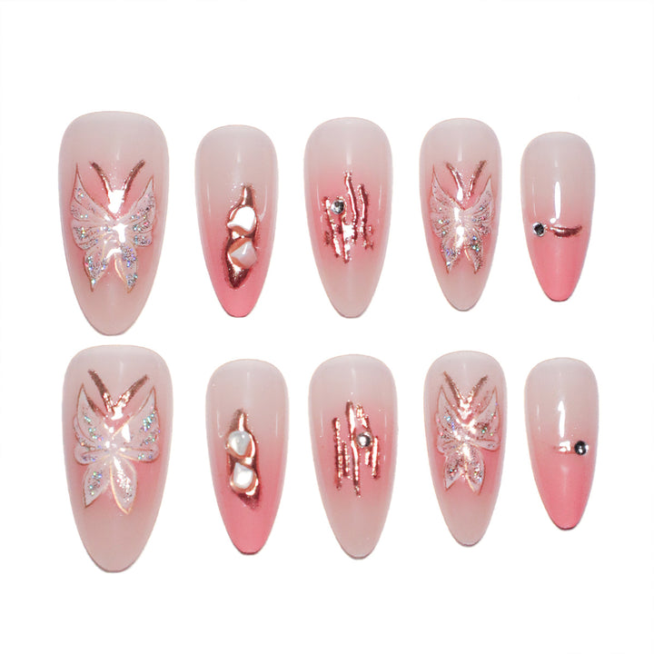 Künstliche Nagelverlängerungen mit floralen Motiven und Glitzerakzenten Karnz