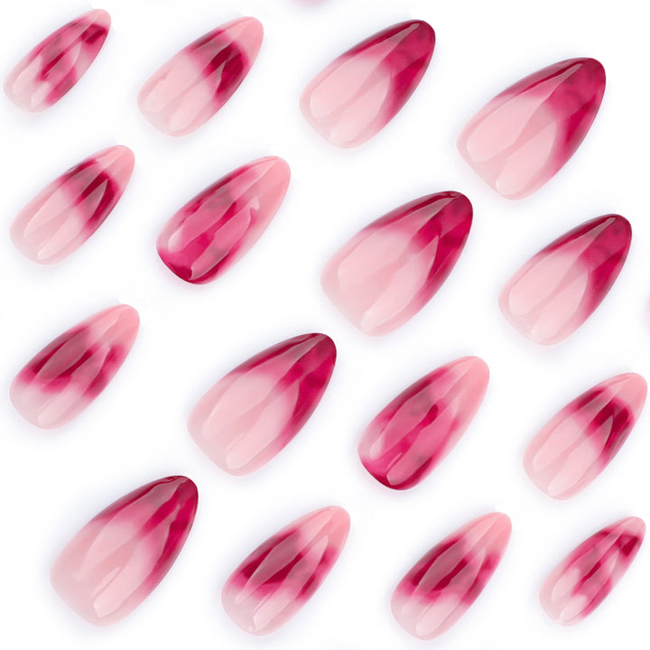 Kunstvolle Stiletto-Nägel mit glamourösem Farbverlauf Karnz
