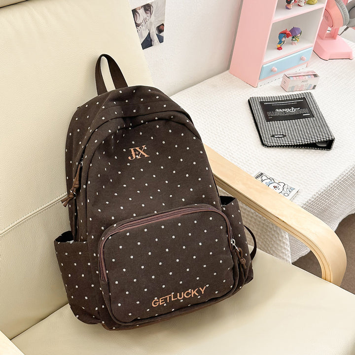 Taschen mit gepunktetem Muster