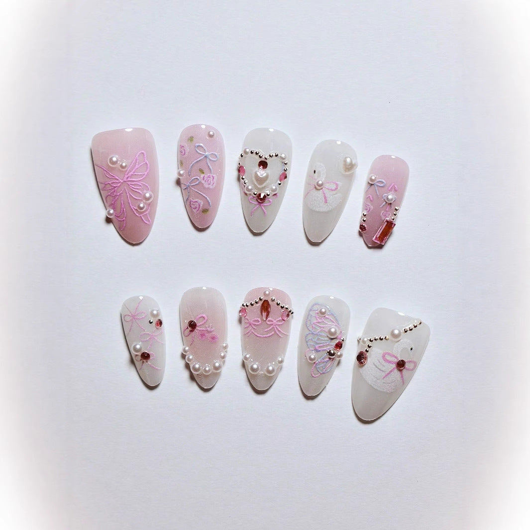 Dekorative 3D Schleife und Perle Press-On Nagelkunst Karnz
