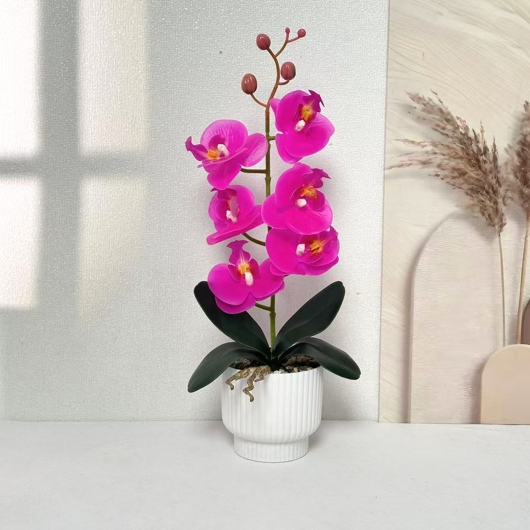 Stylisches Faux-Orchideenpflanzenarrangement