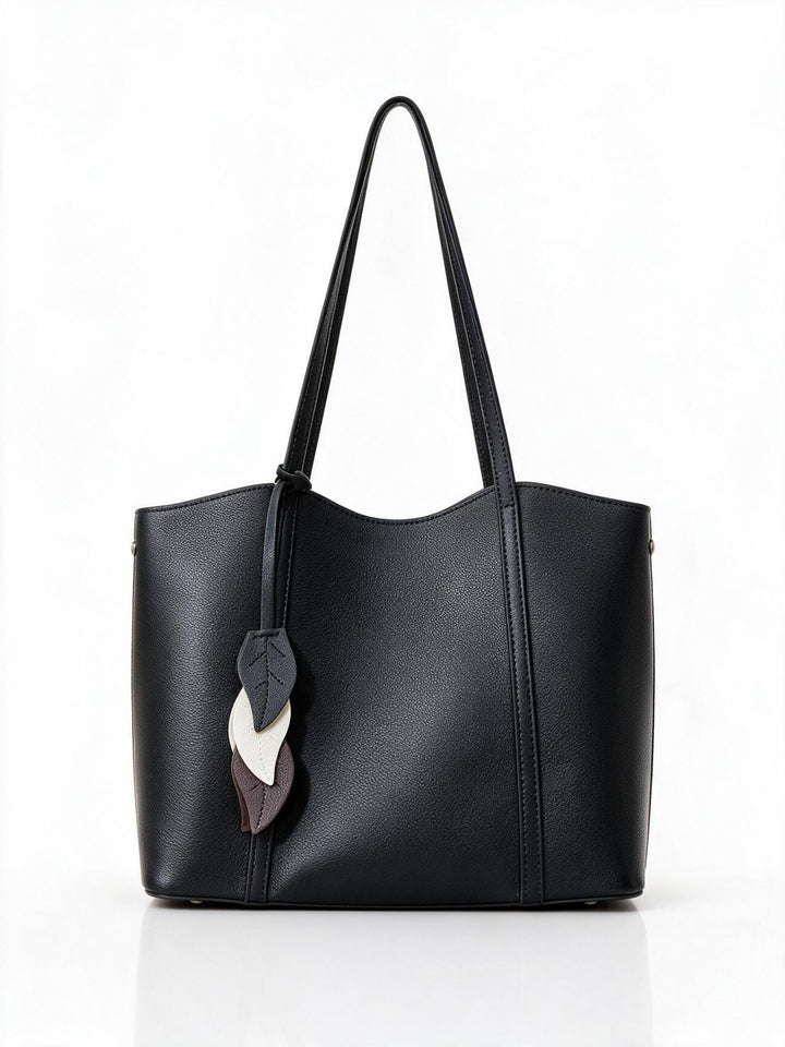 Gepunktetes vegan-leder strukturiertes Tote mit Blattcharm & langen Schulterträgern