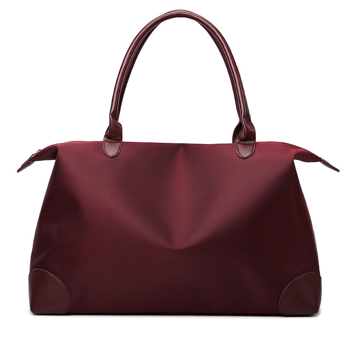 Wasserfester erweiterbarer Reisehandtasche