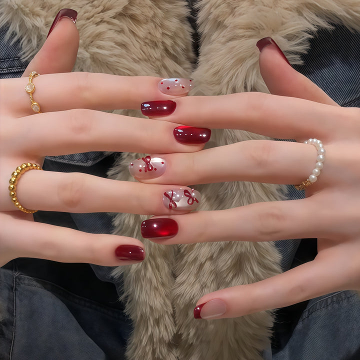 Elegante Kunstnagelset mit Dekorativer Schleifenakzenten Karnz