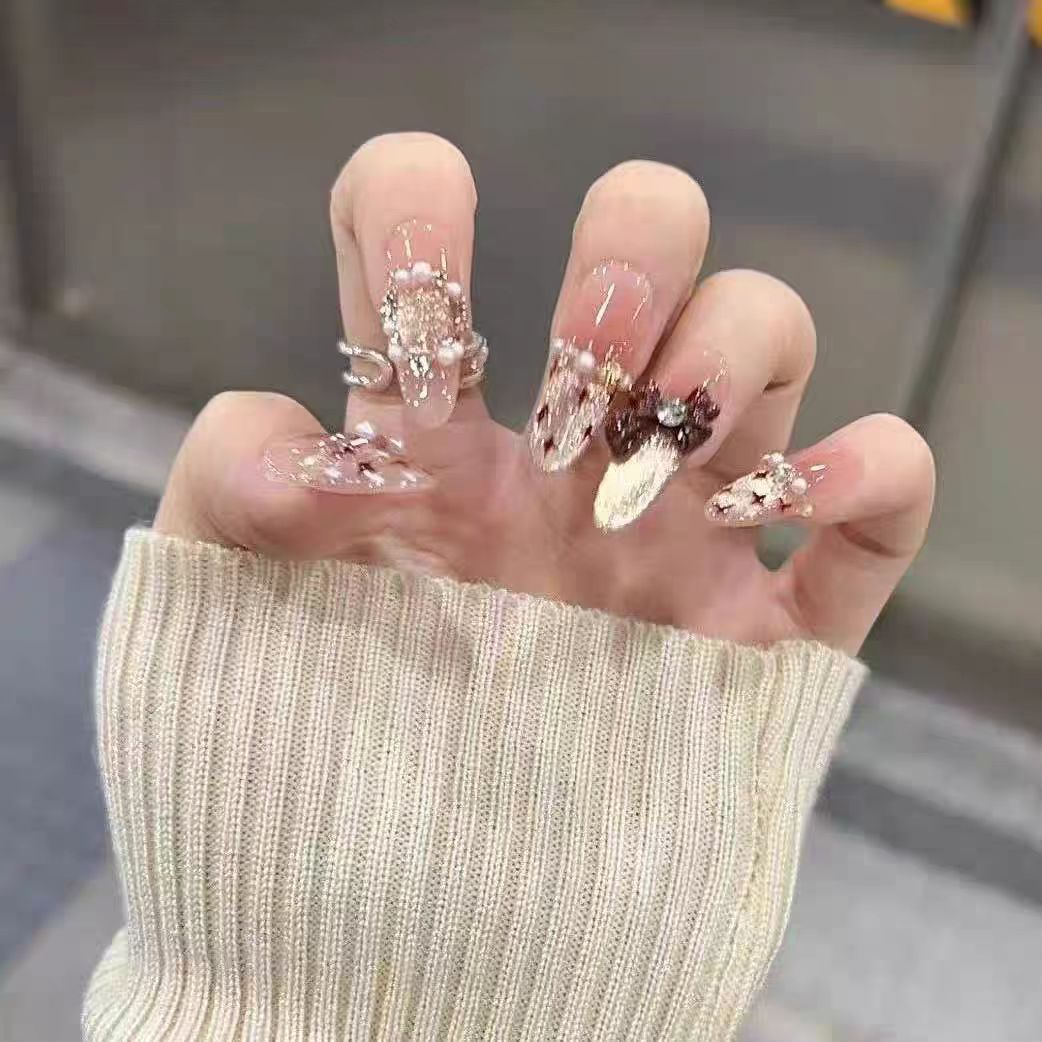 Elegante Drucknägel-Set mit Herz- und Schleifenmotiven Karnz