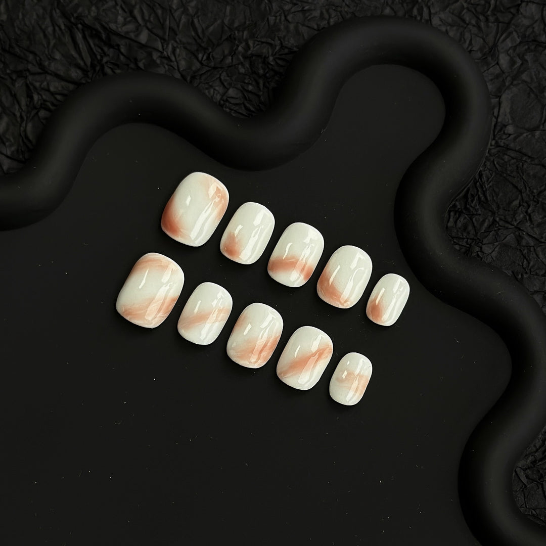 Künstlerisches Press-On Nagelset mit marmoriertem Design