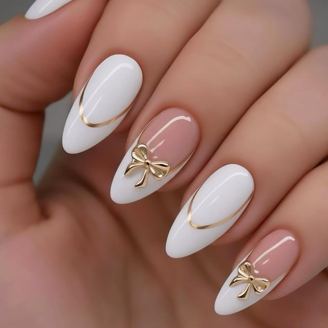 Elegante Stiletto-Nagelverlängerungen mit dekorativen Schleifenakzenten Karnz